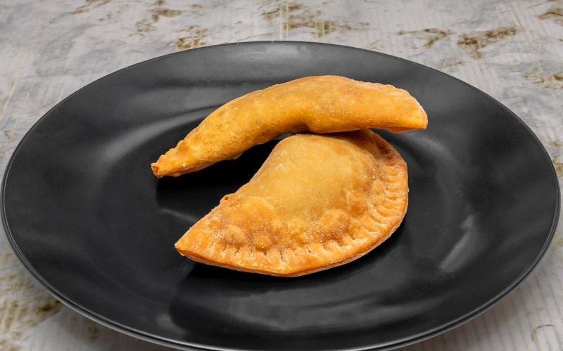 Delicious empanada we have beef, chicken, cheese and jam and cheese -