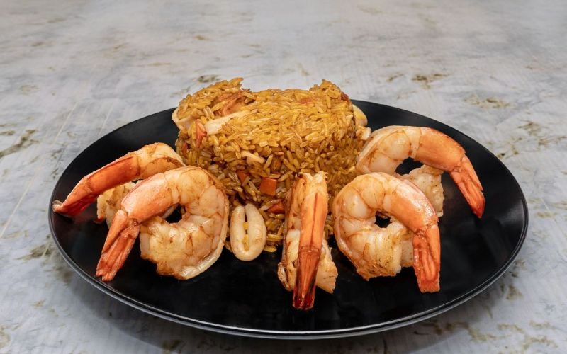 Ready for a taste adventure? Our delectable seafood fried rice is the perfect fresh option for your next meal! Join us at the best Dominican restaurant in Lawrence, Massachusetts, and order online now!